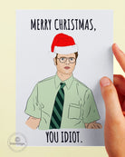 Dwight Christmas Card- Merry Christmas You Idiot Greeting Card - UntamedEgo LLC.