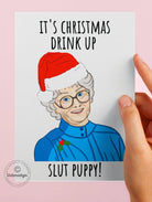 Sophie Christmas Card- It's Christmas Drink Up Slut Puppy Greeting Card - UntamedEgo LLC.